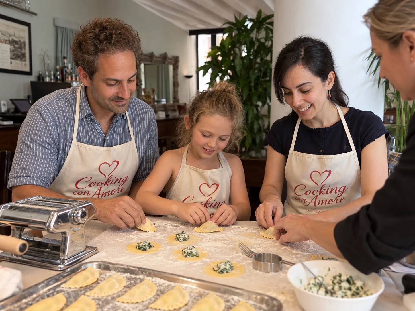 Adults and children enjoying a hands-on pasta class together